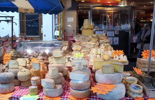 Cheese at Rue de Buci food market in St Germain des Pres, Paris
